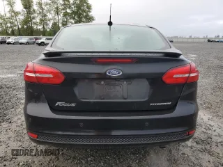 2015 Ford Focus Titanium with VIN 1FADP3J23FL269878, listed as a Copart auction lot 55171975 with 84,499 mi miles and Clean Title. Bid and sale history available at carsss.com. Image 6.