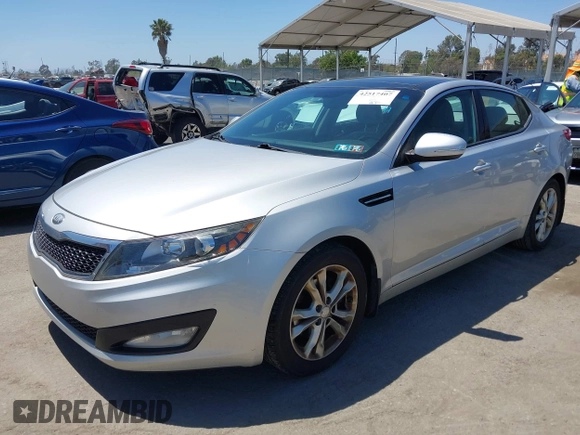 2013 Kia Optima EX with VIN 5XXGN4A72DG199317, listed as a IAAI auction lot 42517407 with 160,402 mi miles and . Bid and sale history available at DreamBid. Image 2.