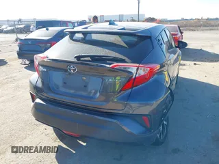 2019 Toyota C-HR XLE with VIN JTNKHMBX1K1062180, listed as a IAAI auction lot 41769979 with 75,159 mi miles. Bid and sale history available at carsss.com. Image 4.