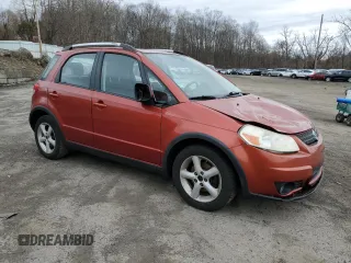 2009 Suzuki SX4 Touring AWD with VIN JS2YB417896201449, listed as a Copart auction lot 48505545 with 180,734 mi miles and Salvage Title. Bid and sale history available at DreamBid. Image 4.