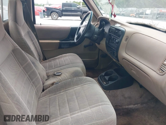 1997 Ford Ranger XLT with VIN 1FTCR10X1VUB67702, listed as a IAAI auction lot 42503161 with 142,432 mi miles and . Bid and sale history available at DreamBid. Image 5.