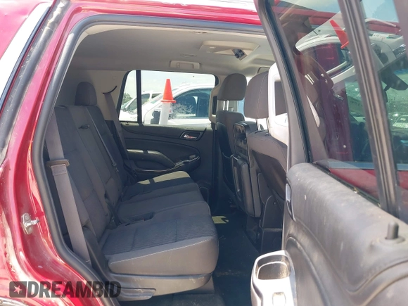 2015 Chevrolet Tahoe LS with VIN 1GNSCAEC4FR121571, listed as a IAAI auction lot 42499156 with 131,284 mi miles and . Bid and sale history available at DreamBid. Image 8.