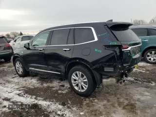 2023 Cadillac XT6 AWD Luxury z VIN 1GYKPBR45PZ159666, wystawiony jako Copart lot #39370954 z przebiegiem 12 778 mil mil oraz . Historia ofert i sprzedaży dostępna na DreamBid. Obrazek 2.