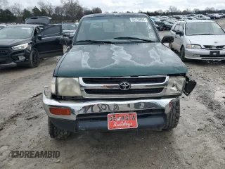 1999 Toyota Tacoma PreRunner z VIN 4TASM92N5XZ417982, wystawiony jako Copart lot #85216054 z przebiegiem 200 772 mil mil oraz Szkoda całkowita • Salvage title. Historia ofert i sprzedaży dostępna na DreamBid. Obrazek 5.