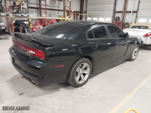 2011 Dodge Charger Road/Track with VIN 2B3CL5CT9BH511648, listed as a IAAI auction lot 42001157 with 103,223 mi miles. Bid and sale history available at carsss.com. Image 4.