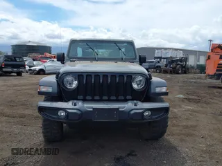 2021 Jeep Wrangler Unlimited Willys with VIN 1C4HJXDGXMW763324, listed as a IAAI auction lot 41643296 with 22,599 mi miles and . Bid and sale history available at DreamBid. Image 12.