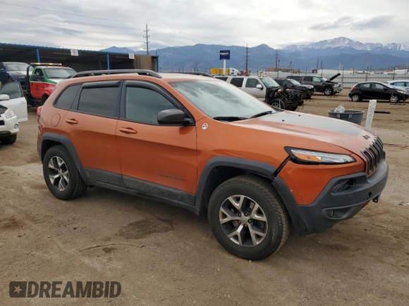 2016 Jeep Cherokee Trailhawk with VIN 1C4PJMBS2GW132928, listed as a Copart auction lot 50914955 with 156,993 mi miles and Salvage Title. Bid and sale history available at DreamBid. Image 4.