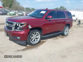 2019 Chevrolet Tahoe LT z VIN 1GNSCBKC9KR102552, wystawiony jako IAAI lot #41792517 z przebiegiem 92 856 mil mil oraz . Historia ofert i sprzedaży dostępna na DreamBid. Obrazek 17.