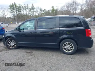 2019 Dodge Grand Caravan SXT with VIN 2C4RDGCG9KR804867, listed as a IAAI auction lot 42032311 with 157,351 mi miles and . Bid and sale history available at DreamBid. Image 14.
