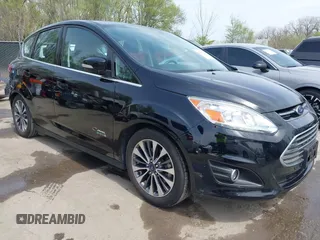 2017 Ford C-Max Energi Titanium with VIN 1FADP5FU2HL115199, listed as a IAAI auction lot 42001944 with 57,609 mi miles. Bid and sale history available at carsss.com. Image 1.