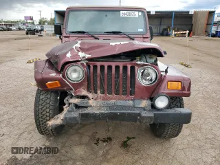 2002 Jeep Wrangler Sahara with VIN 1J4FA59S32P746410, listed as a Copart auction lot 56403075 with 147,968 mi miles and Salvage title. Bid and sale history available at DreamBid. Image 5.