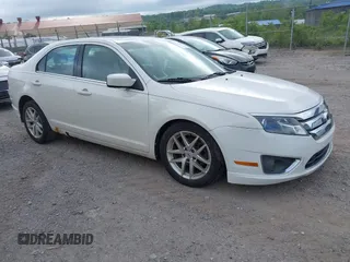 2012 Ford Fusion SEL z VIN 3FAHP0JAXCR326453, wystawiony jako IAAI lot #42306828 z przebiegiem 182 880 mil mil oraz . Historia ofert i sprzedaży dostępna na DreamBid. Obrazek 1.