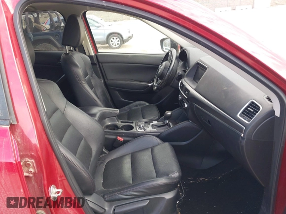 2016 Mazda CX-5 Grand Touring with VIN JM3KE4DY8G0729446, listed as a IAAI auction lot 41871207 with 89,258 mi miles. Bid and sale history available at carsss.com. Image 5.