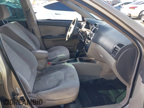 2004 Kia Spectra LX with VIN KNAFE122145013930, listed as a IAAI auction lot 41627031 with 93,565 mi miles. Bid and sale history available at carsss.com. Image 5.