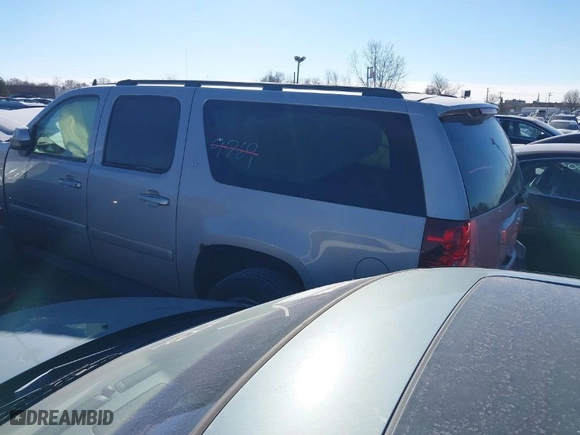 2007 Chevrolet Suburban LT with VIN 1GNFK16327J351287, listed as a IAAI auction lot 38288423 with 152,511 mi miles. Bid and sale history available at carsss.com. Image 3.