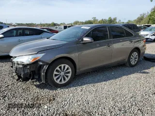 2015 Toyota Camry XLE with VIN 4T1BF1FKXFU899517, listed as a Copart auction lot 56001835 with 124,675 mi miles and Salvage Title. Bid and sale history available at DreamBid. Image 1.