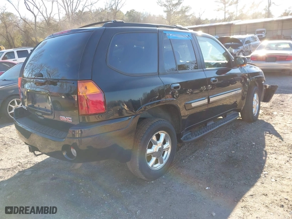 2005 GMC Envoy SLE with VIN 1GKDS13S152246568, listed as a IAAI auction lot 41293887 with 315,882 mi miles. Bid and sale history available at carsss.com. Image 4.
