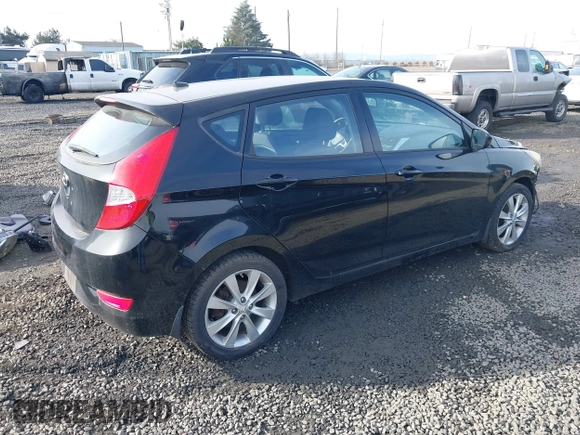 2012 Hyundai Accent SE with VIN KMHCU5AEXCU053645, listed as a IAAI auction lot 41407582 with 118,290 mi miles. Bid and sale history available at carsss.com. Image 4.