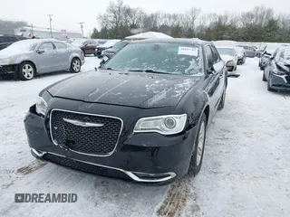 2016 Chrysler 300 with VIN 2C3CCAEG2GH127956, listed as a IAAI auction lot 41601383 with 68,757 mi miles. Bid and sale history available at carsss.com. Image 2.