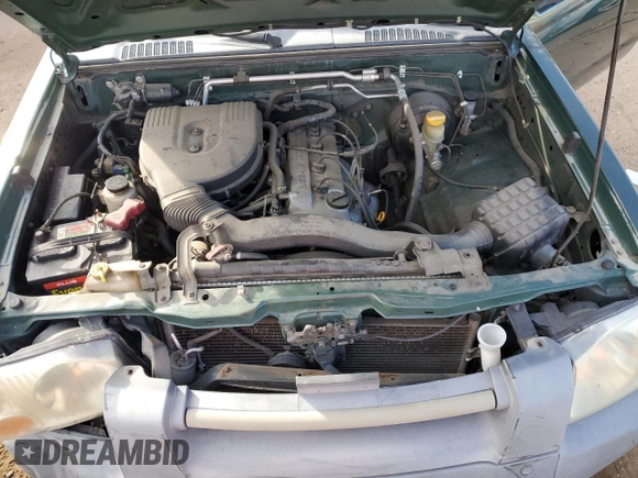 2001 Nissan Frontier XE with VIN 1N6DD26S21C320590, listed as a Copart auction lot 78059624 with Not provided miles and Salvage title. Bid and sale history available at DreamBid. Image 12.