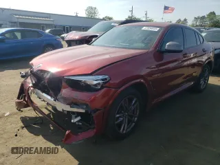 2021 BMW X4 M40i with VIN 5UX2V5C0XM9E78318, listed as a Copart auction lot 57834645 with 67,277 mi miles and Salvage title. Bid and sale history available at DreamBid. Image 1.