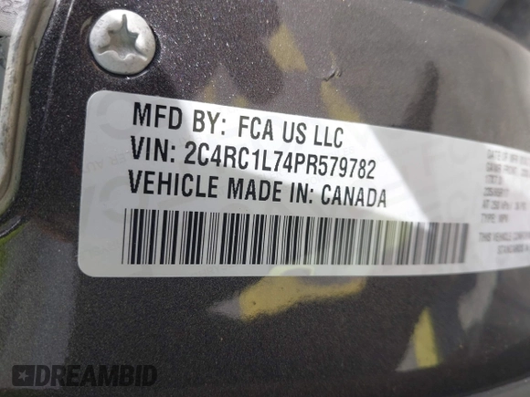 2023 Chrysler Pacifica Hybrid Touring L with VIN 2C4RC1L74PR579782, listed as a IAAI auction lot 42487390 with Not provided miles and . Bid and sale history available at DreamBid. Image 9.