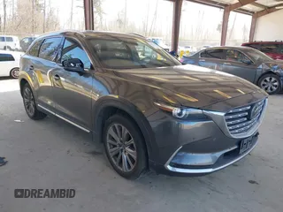 2021 Mazda CX-9 Signature with VIN JM3TCBEY9M0504963, listed as a IAAI auction lot 41756255 with 49,946 mi miles. Bid and sale history available at carsss.com. Image 1.