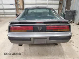 1990 Pontiac Firebird z VIN 1G2FS23T2LL200780, wystawiony jako Copart lot #50364665 z przebiegiem 101 108 mil mil oraz Czysty tytuł • Clean title. Historia ofert i sprzedaży dostępna na DreamBid. Obrazek 6.
