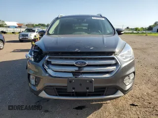2019 Ford Escape Titanium with VIN 1FMCU0J96KUB22884, listed as a Copart auction lot 61979665 with 63,824 mi miles and Salvage title. Bid and sale history available at DreamBid. Image 5.
