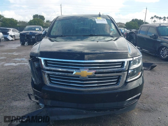 2018 Chevrolet Suburban Premier with VIN 1GNSCJKC2JR199702, listed as a IAAI auction lot 41136128 with 80,103 mi miles and . Bid and sale history available at DreamBid. Image 11.