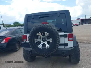 2011 Jeep Wrangler Unlimited Rubicon with VIN 1J4BA6H10BL536027, listed as a IAAI auction lot 42567901 with 164,487 mi miles and . Bid and sale history available at DreamBid. Image 16.