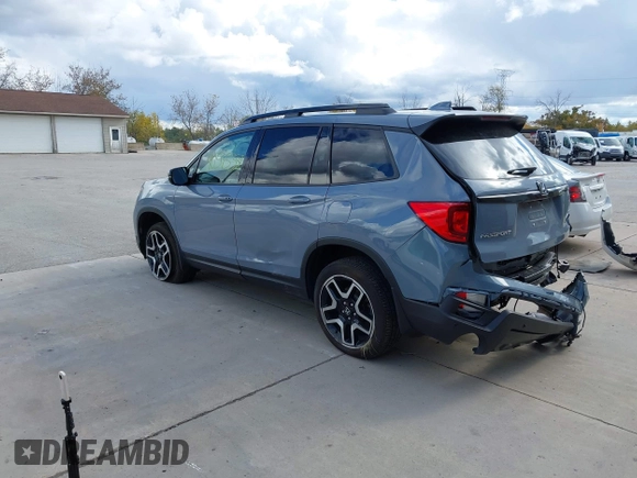 2023 Honda Passport Elite with VIN 5FNYF8H03PB000039, listed as a IAAI auction lot 40593339 with 33,697 mi miles and . Bid and sale history available at DreamBid. Image 3.