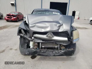 2008 Mitsubishi Raider LS z VIN 1Z7HC28K98S619809, wystawiony jako Copart lot #74547364 z przebiegiem 122 835 mil mil oraz Szkoda całkowita • Salvage title. Historia ofert i sprzedaży dostępna na DreamBid. Obrazek 5.