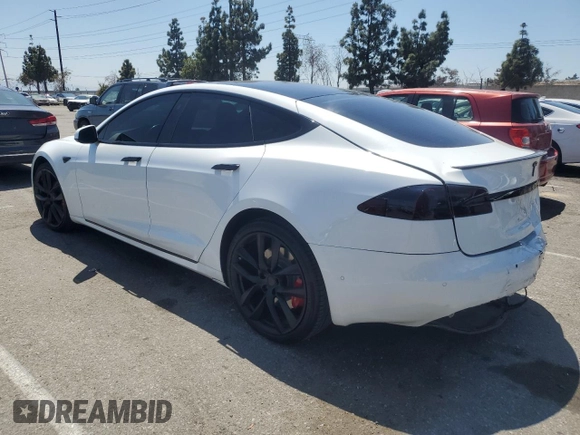 2020 Tesla Model S Performance with VIN 5YJSA1E42LF401157, listed as a Copart auction lot 55082875 with 60,376 mi miles and Salvage title. Bid and sale history available at DreamBid. Image 2.