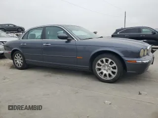2004 Jaguar XJ with VIN SAJWA71C04SG22878, listed as a Copart auction lot 44383205 with 127,515 mi miles and Clean Title. Bid and sale history available at carsss.com. Image 4.