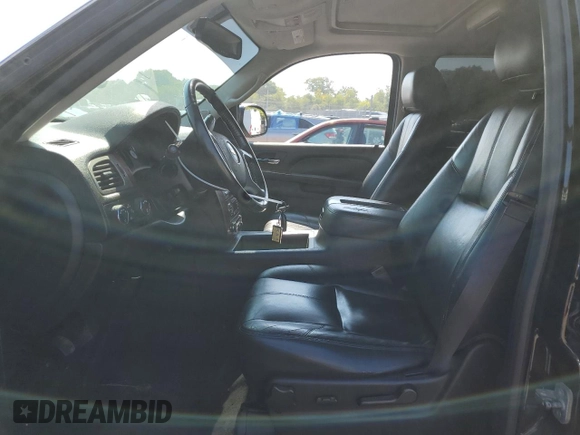2014 Chevrolet Suburban LT with VIN 1GNSKJE72ER131763, listed as a Copart auction lot 69026754 with 186,248 mi miles and Salvage Title. Bid and sale history available at carsss.com. Image 7.
