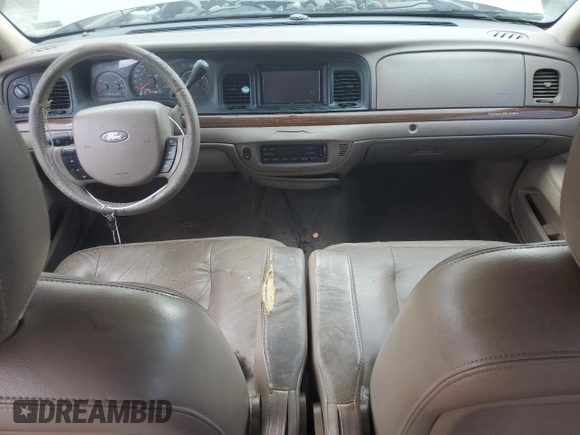 2005 Ford Crown Victoria LX z VIN 2FAFP74W95X147431, wystawiony jako Copart lot #73487374 z przebiegiem 203 107 mil mil oraz Nie do naprawy • Non repairable. Historia ofert i sprzedaży dostępna na DreamBid. Obrazek 8.