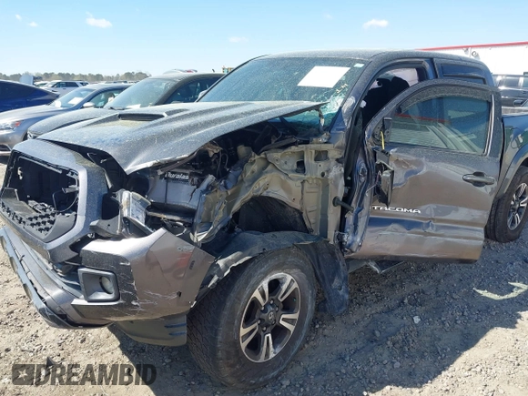 2017 Toyota Tacoma SR5 with VIN 5TFAZ5CN7HX033594, listed as a IAAI auction lot 41881117 with 86,676 mi miles and . Bid and sale history available at DreamBid. Image 6.