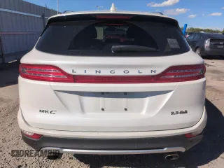 2015 Lincoln MKC z VIN 5LMTJ2AH7FUJ26375, wystawiony jako Copart lot #57830425 z przebiegiem 96 169 mil mil oraz Szkoda całkowita • Salvage title. Historia ofert i sprzedaży dostępna na DreamBid. Obrazek 6.