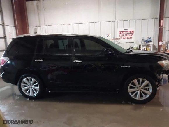 2009 Toyota Highlander Hybrid Limited with VIN JTEEW44A192035643, listed as a IAAI auction lot 41330015 with 200,839 mi miles. Bid and sale history available at carsss.com. Image 14.