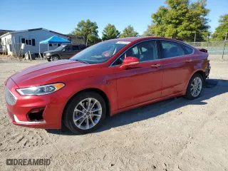 2020 Ford Fusion Plug-In Hybrid Titanium with VIN 3FA6P0SU6LR218086, listed as a Copart auction lot 74667704 with 164,738 mi miles and Salvage Title. Bid and sale history available at carsss.com. Image 1.