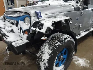 2013 Jeep Wrangler Unlimited Sport z VIN 1C4BJWDG3DL628784, wystawiony jako IAAI lot #41311183 z przebiegiem 125 118 mil mil oraz . Historia ofert i sprzedaży dostępna na DreamBid. Obrazek 6.