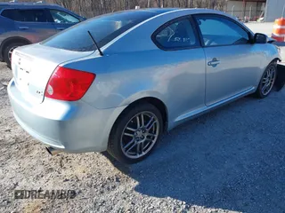 2006 Scion tC with VIN JTKDE177960090990, listed as a IAAI auction lot 41690362 with 197,613 mi miles. Bid and sale history available at carsss.com. Image 4.