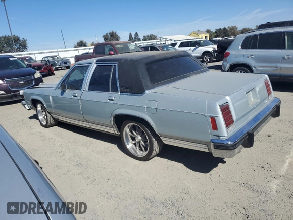 1987 Ford Crown Victoria z VIN 2FABP74F5HX169963, wystawiony jako Copart lot #75491944 z przebiegiem 89 729 mil mil oraz Szkody całkowita. Historia ofert i sprzedaży dostępna na DreamBid. Obrazek 2.