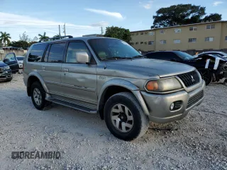 2002 Mitsubishi Montero z VIN JA4MT41R62J021195, wystawiony jako Copart lot #47021115 z przebiegiem 196 795 mil mil oraz Szkoda całkowita • Salvage title. Historia ofert i sprzedaży dostępna na DreamBid. Obrazek 4.