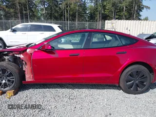 2023 Tesla Model S with VIN 5YJSA1E5XPF516779, listed as a IAAI auction lot 42110737 with 16,465 mi miles and . Bid and sale history available at DreamBid. Image 15.
