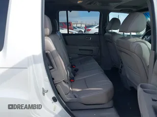 2013 Honda Pilot Touring z VIN 5FNYF4H99DB017351, wystawiony jako IAAI lot #42355167 z przebiegiem 122 191 mil mil oraz . Historia ofert i sprzedaży dostępna na DreamBid. Obrazek 8.