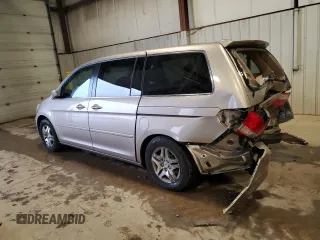 2007 Honda Odyssey EX-L with VIN 5FNRL38747B409907, listed as a Copart auction lot 52783605 with 151,225 mi miles and Salvage Title. Bid and sale history available at carsss.com. Image 2.