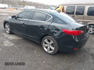 2014 Acura ILX with VIN 19VDE1F32EE007212, listed as a IAAI auction lot 41748681 with 102,710 mi miles and . Bid and sale history available at DreamBid. Image 3.