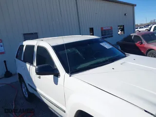 2007 Jeep Grand Cherokee Laredo with VIN 1J8HS48PX7C657685, listed as a IAAI auction lot 41748528 with 247,534 mi miles. Bid and sale history available at carsss.com. Image 6.